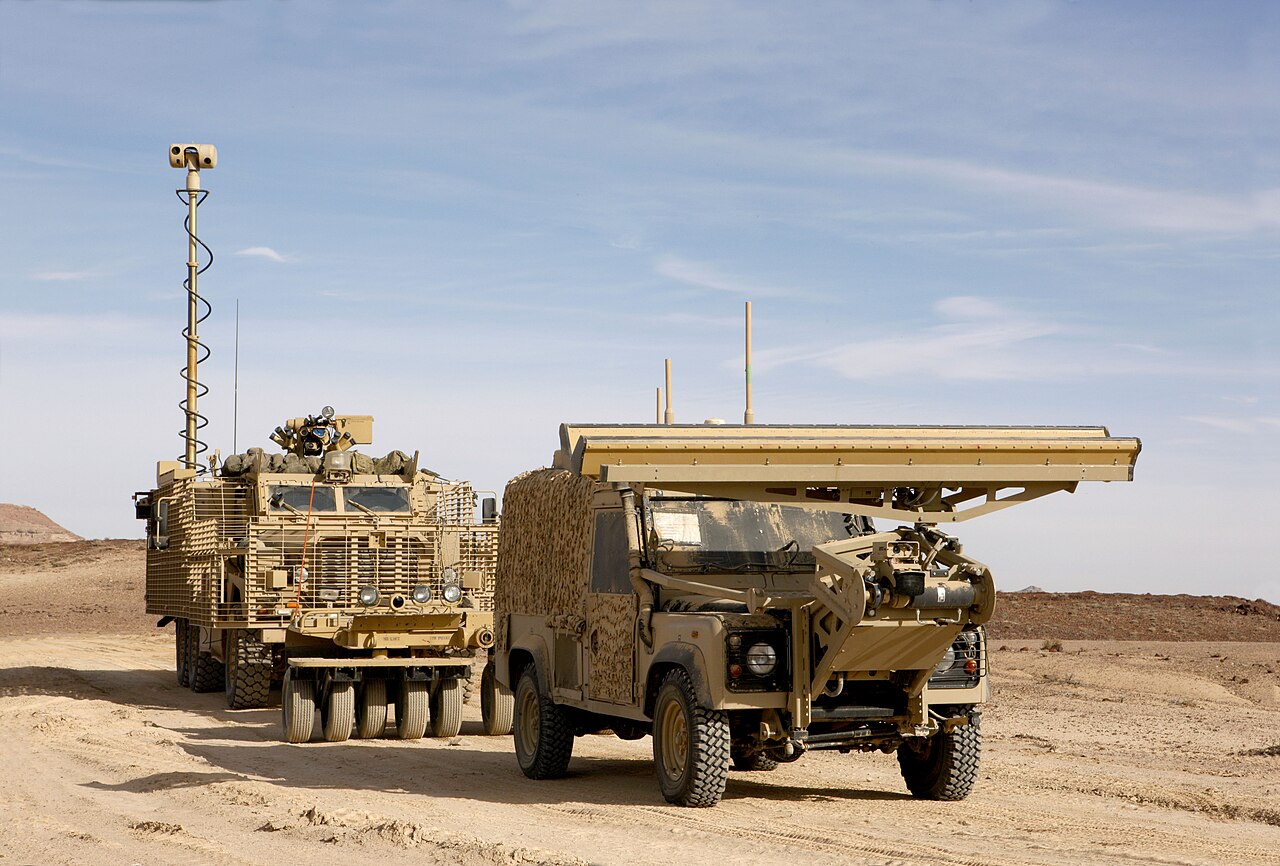 Not the firm but the programme it ran: a Panama remotely operated Snatch Land Rover with its ground-penetrating radar boom, alongside the Mastiff from which it was driven, in Afghanistan. PA Consulting was the MoD's programme partner; the conversion itself was MIRA's work.