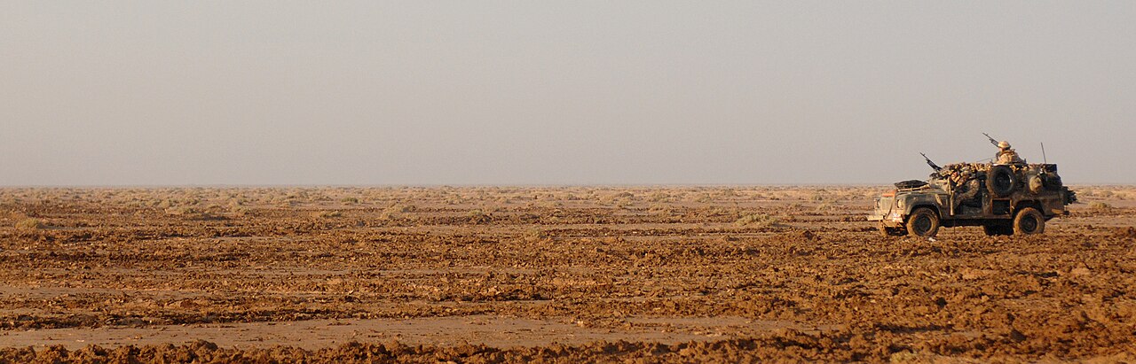 A WMIK of The Queen's Royal Lancers on patrol in Maysan Province, Iraq — the weapons-mount kit Ricardo developed with Land Rover for the Wolf Defender 110.